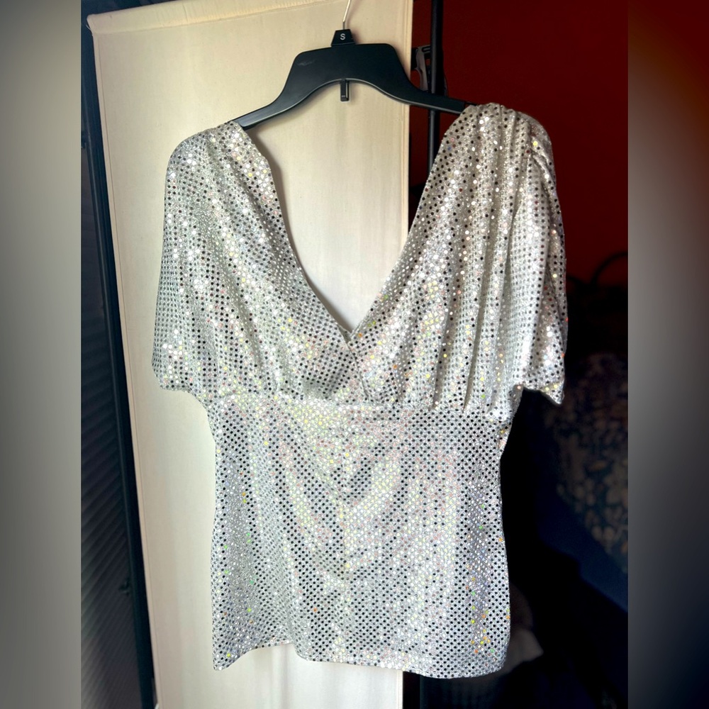 Silver sequin homemade disco shirt.